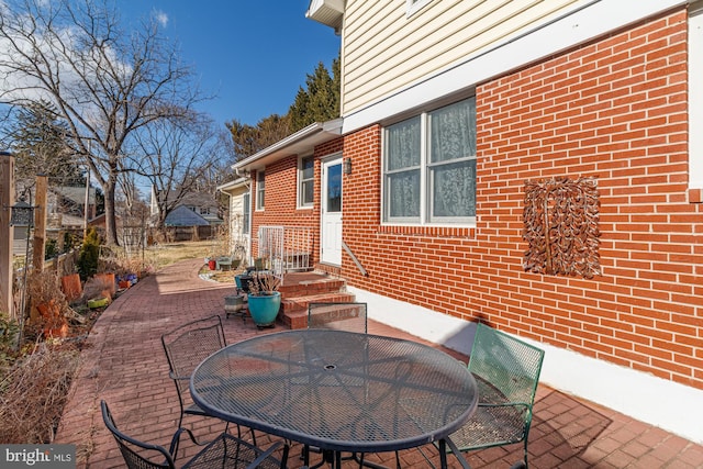 view of patio with outdoor dining area