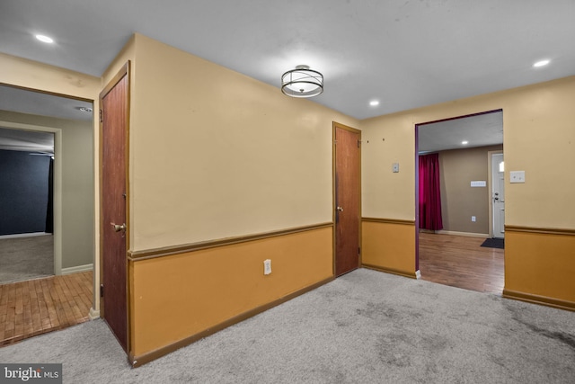 unfurnished room with light carpet