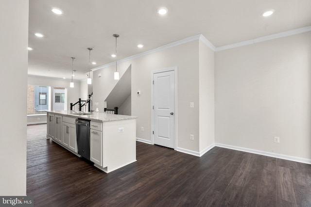 kitchen with hanging light fixtures, stainless steel dishwasher, light stone countertops, a kitchen island with sink, and white cabinets