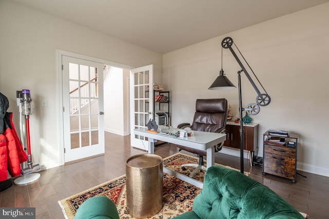 office featuring french doors and hardwood / wood-style floors