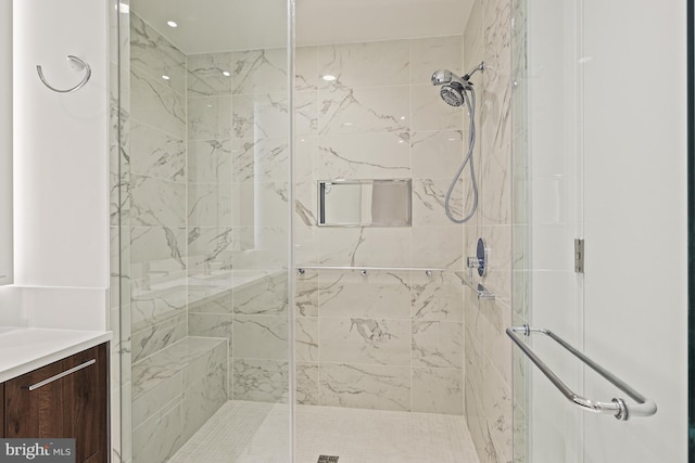 bathroom featuring vanity and walk in shower