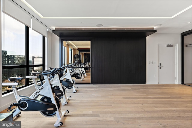 gym with light wood-type flooring