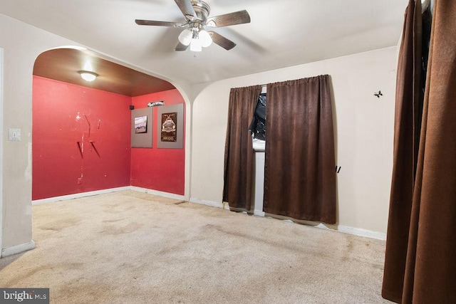 unfurnished room featuring ceiling fan