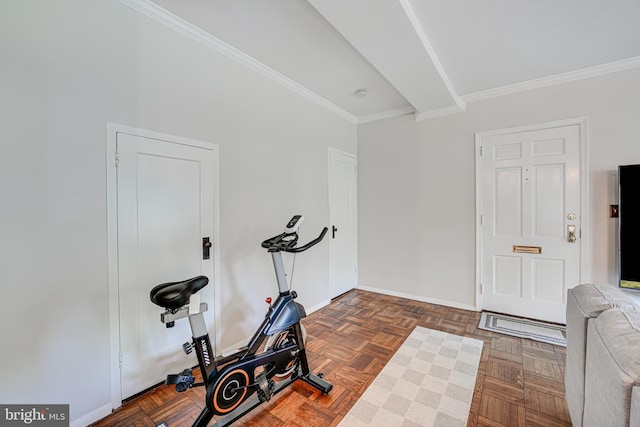 workout area with crown molding and dark parquet flooring