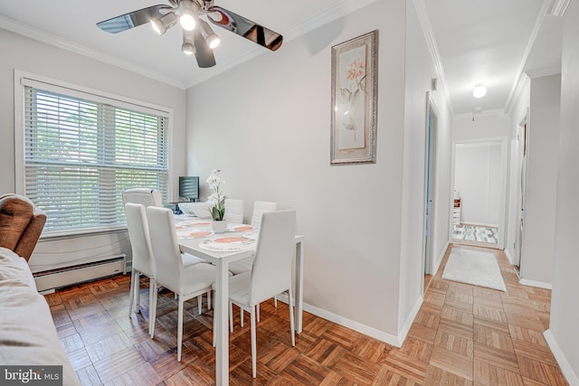 dining room with a baseboard radiator, crown molding, and parquet flooring