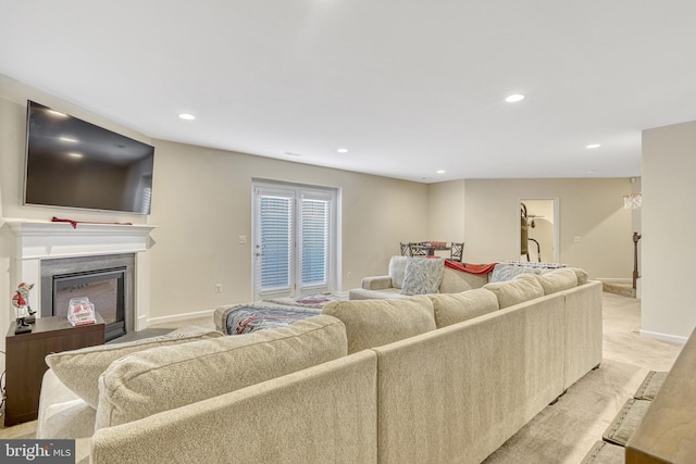 living room featuring light carpet