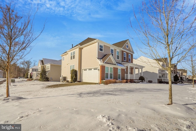 view of property exterior with a garage and central air condition unit