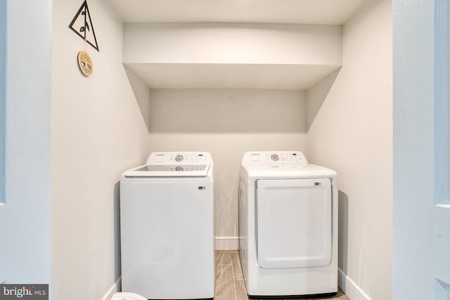 laundry room featuring independent washer and dryer