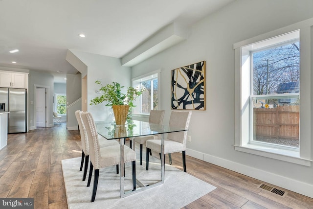 dining room featuring light hardwood / wood-style floors