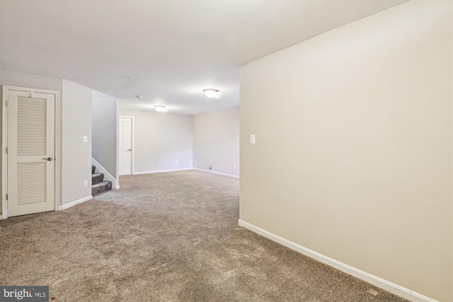 spare room with carpet floors