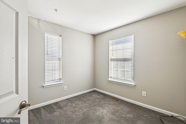 view of carpeted spare room