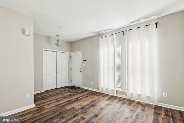 interior space featuring dark wood-type flooring