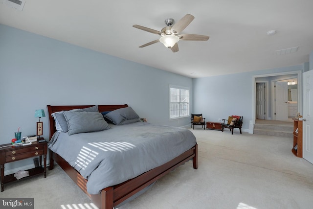 carpeted bedroom with ceiling fan