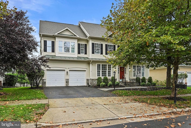 multi unit property featuring a garage