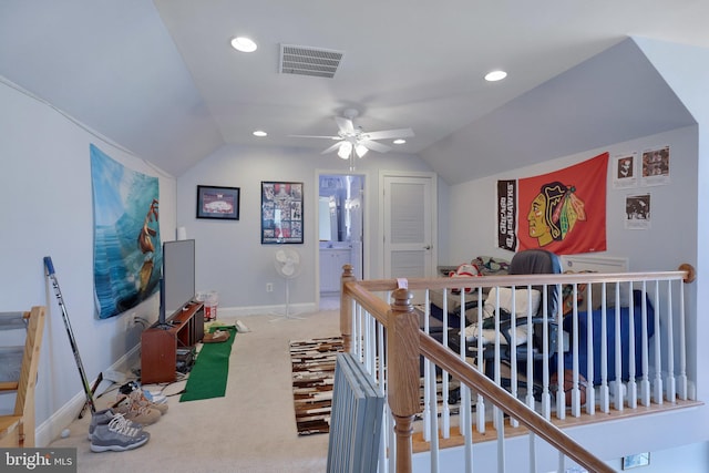 interior space featuring vaulted ceiling and ceiling fan