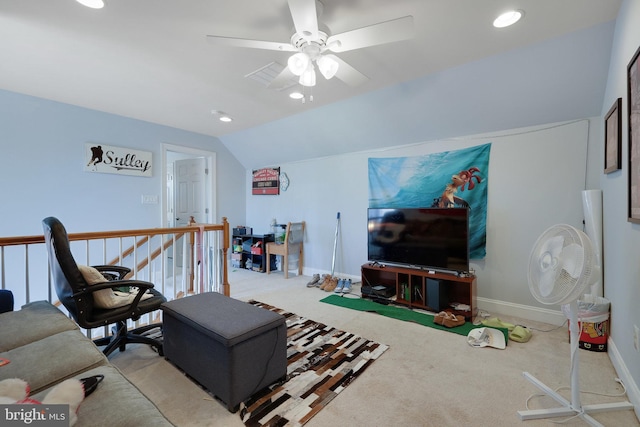 carpeted living room featuring ceiling fan and lofted ceiling