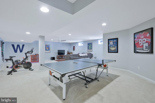 recreation room featuring light colored carpet