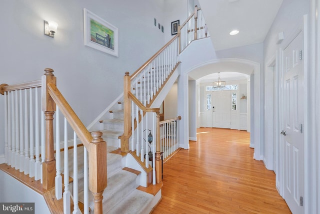 staircase featuring hardwood / wood-style flooring