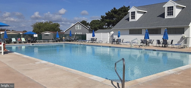 view of pool featuring a patio area