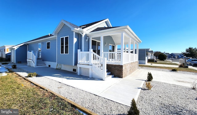 view of property exterior featuring a porch