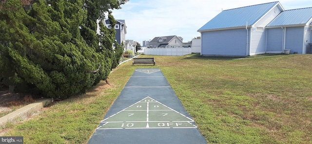 surrounding community featuring a lawn