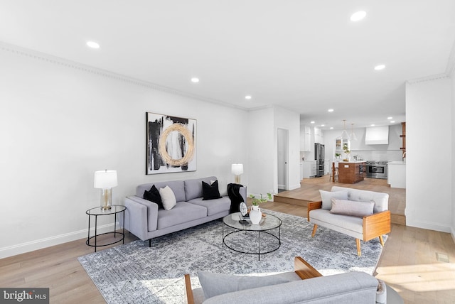 living room with light hardwood / wood-style floors