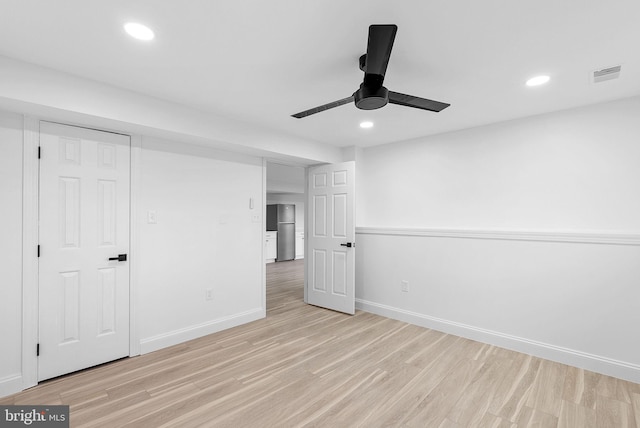 interior space featuring light hardwood / wood-style flooring and ceiling fan