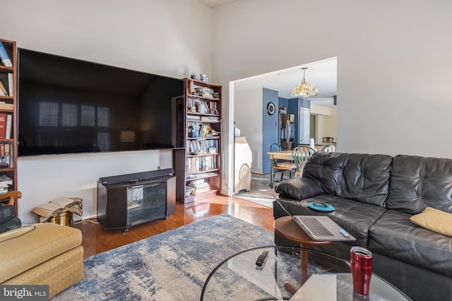 living room with dark hardwood / wood-style floors