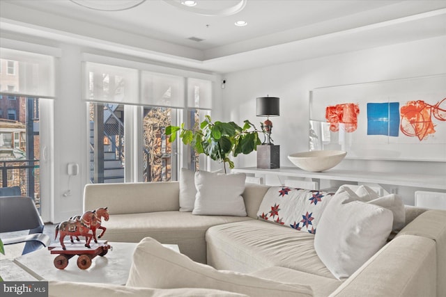 living room featuring plenty of natural light