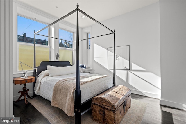 bedroom featuring wood-type flooring