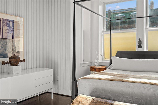 bedroom featuring dark wood-type flooring