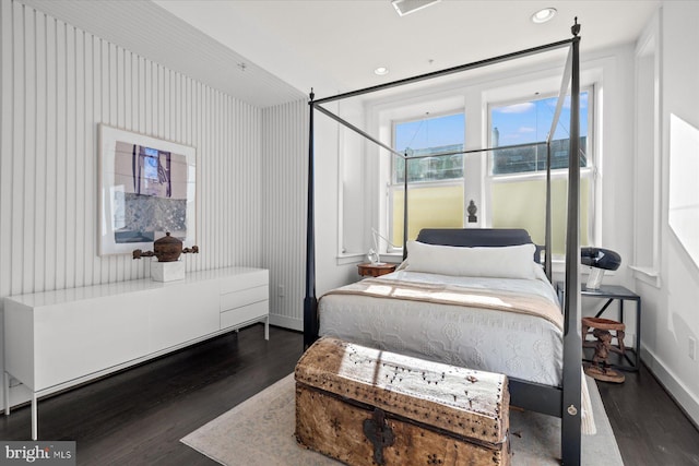 bedroom featuring dark wood-type flooring