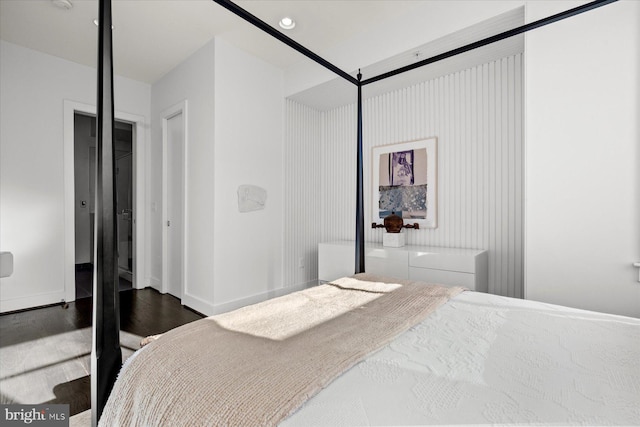 bedroom featuring dark wood-type flooring