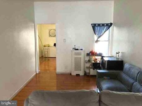 living room with hardwood / wood-style floors