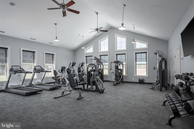 exercise room featuring dark colored carpet, high vaulted ceiling, and ceiling fan