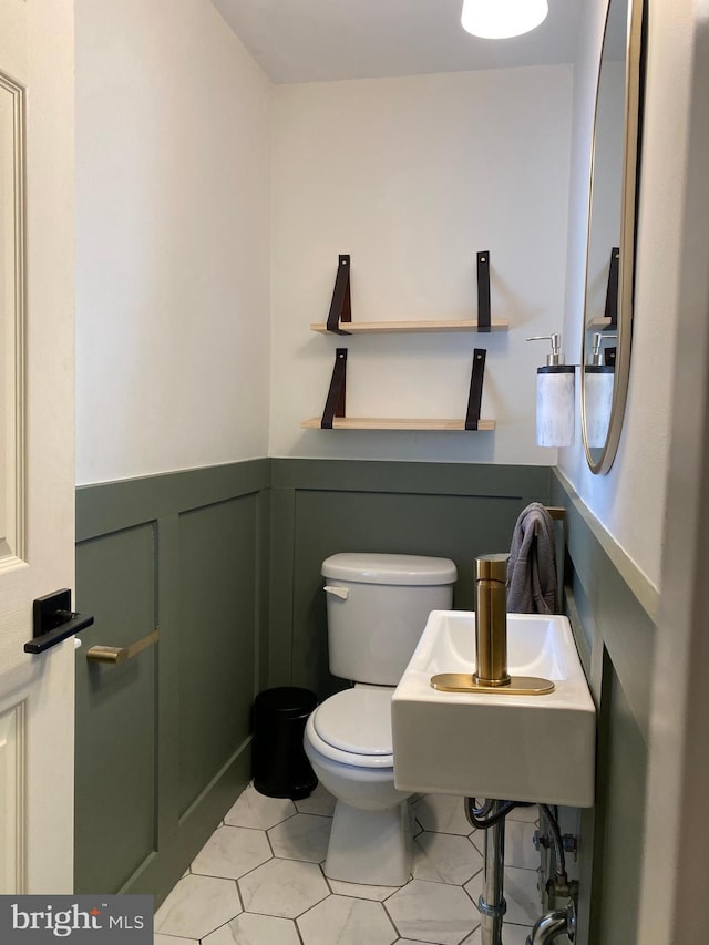 bathroom featuring toilet