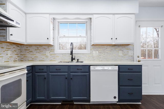 kitchen with extractor fan, white appliances, sink, and white cabinets