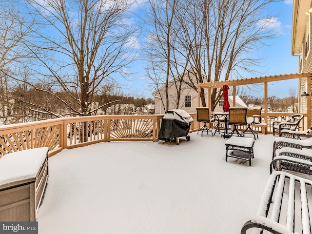 snow covered deck with grilling area