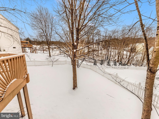 view of snowy yard