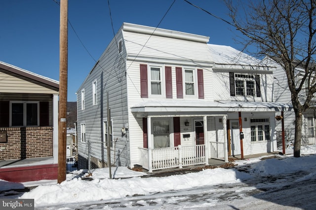 view of front of property featuring covered porch