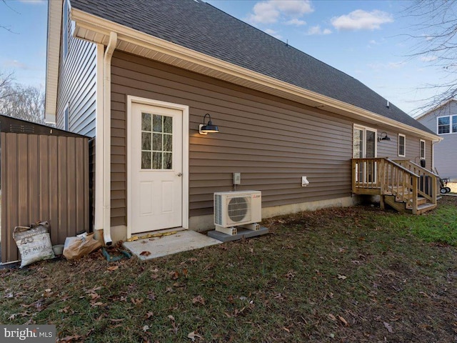 back of property featuring ac unit