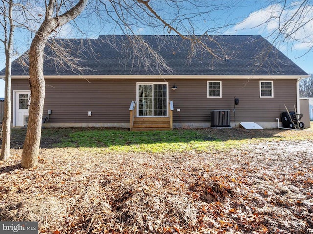 back of property featuring central air condition unit