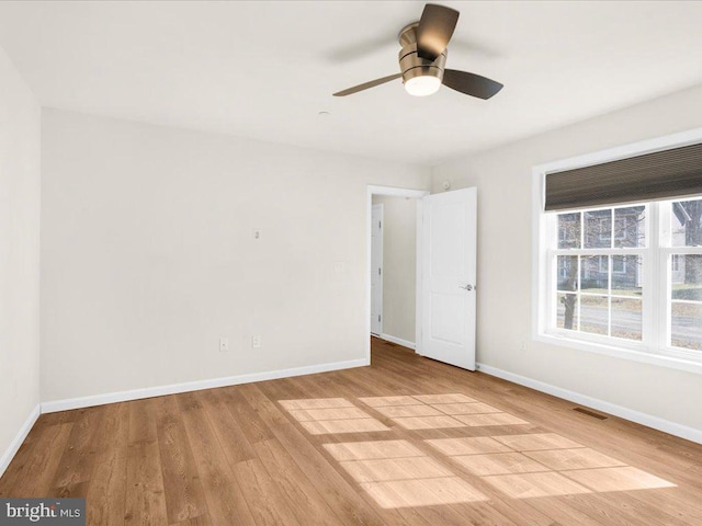 unfurnished bedroom featuring ceiling fan and light wood-type flooring