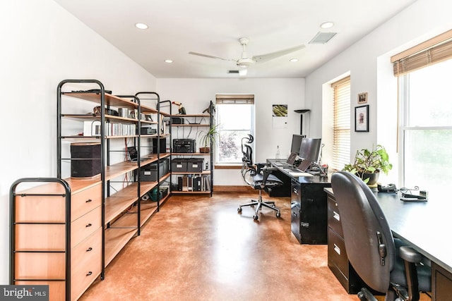 home office with recessed lighting, a ceiling fan, baseboards, finished concrete flooring, and visible vents