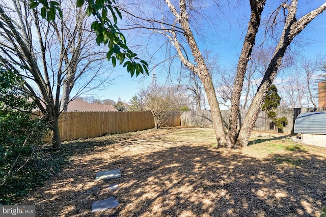 view of yard featuring a fenced backyard