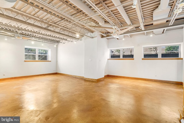 basement featuring baseboards