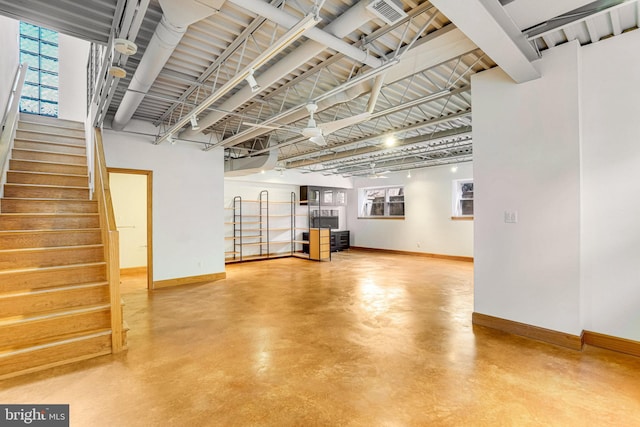 interior space featuring visible vents, stairs, and baseboards