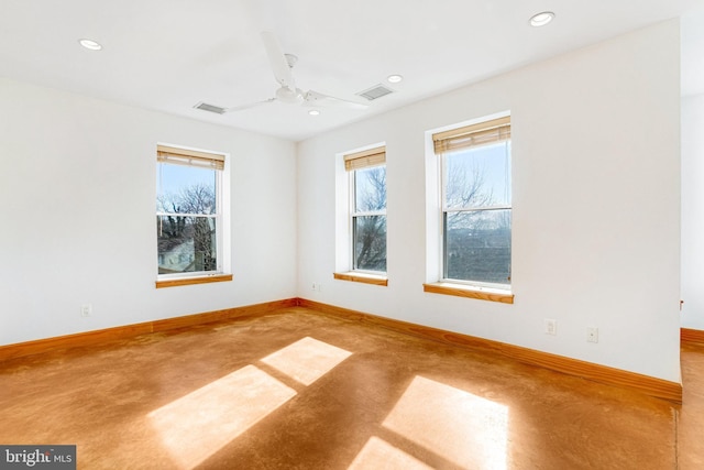 empty room with ceiling fan, recessed lighting, visible vents, and baseboards