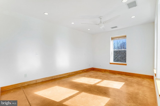 unfurnished room with a ceiling fan, recessed lighting, visible vents, and baseboards