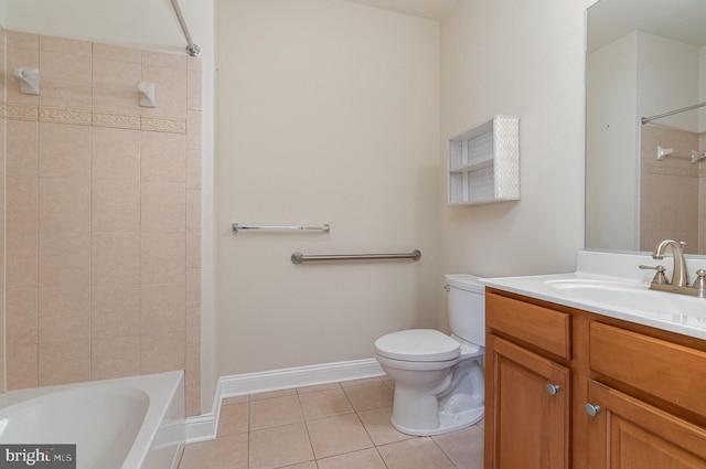 bathroom with vanity, toilet, and tile patterned flooring